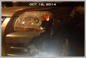 Car Accident: Photo showing damage to the front driver's side area of our car. photo